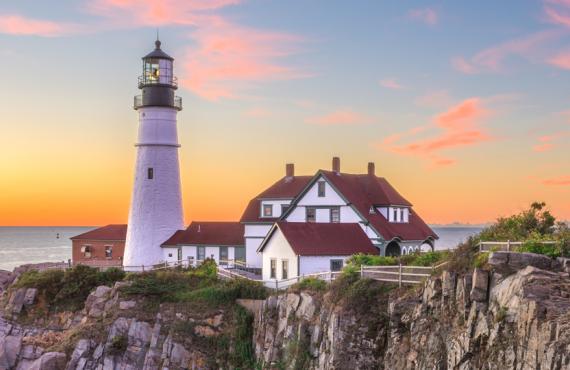 A view of a lighthouse complex situated on the east coast of North America.